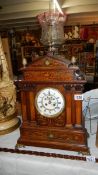 A fine quality rosewood inlaid table clock
