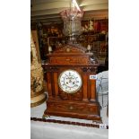 A fine quality rosewood inlaid table clock