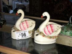 A pair of Victorian Staffordshire swan shaped inkwells