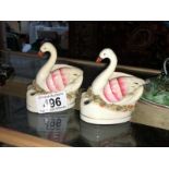 A pair of Victorian Staffordshire swan shaped inkwells