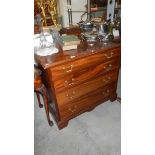 A Georgian 4 drawer chest on bracket feet