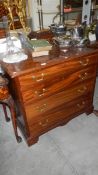 A Georgian 4 drawer chest on bracket feet