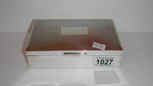 A hall marked silver cigarette box