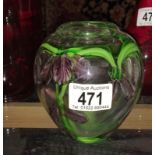 A hand decorated art glass vase