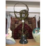 A large bronze hoop dancer signed Morantz, foundry coin to base,