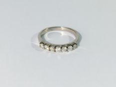A half carat 7 stone white gold and diamond ring,