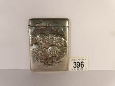 A silver card case depicting cherubs, Birmingham 1851, H.M. 10 x 7.