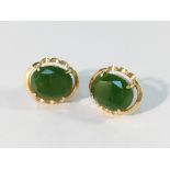 A pair of 18ct gold and jade earrings