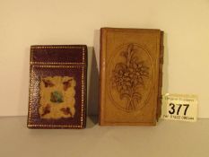 An aide memoir with hand written notes and a card case
