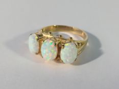 A large 3 stone 9ct yellow gold opal ring size O
