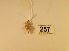 A Lincoln Imp charm in 9ct gold, approximately 11.