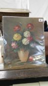 An oil still life study of carnations initialled D R T '12