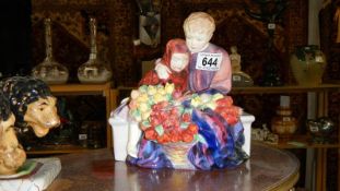 A Royal Doulton figure 'Flower Sellers Children'