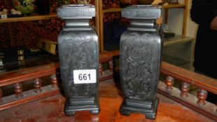 A pair of slate engraved oriental vases