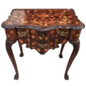 An 18th century marquetry inlaid lowboy