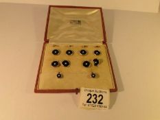 A cased set of 18ct gold enamel and pearl set collar studs and cuff links