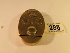 A 19th century brass snuff with combination lock to lid