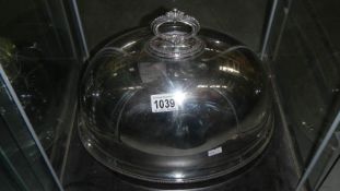 A large silver plate meat cover