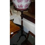 A mahogany plant stand