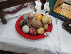 A collection of marble eggs etc