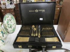 a cased gold plated Solingen Bestecke 70 piece (12 place settings) canteen of cutlery