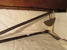 2 mid-late 19th century war axes from the Congo (hand forged iron head with a long intact and