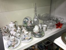 A mixed lot of oriental porcelain tea ware and glass ware (one shelf)