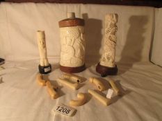 3 Early 20th century ivory items including a pot with wooden lid together with a variety of handles