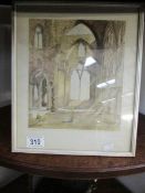 A framed and glazed watercolour of a derelict cathedral