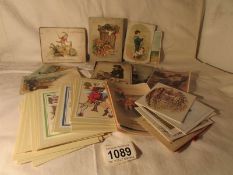 A mixed lot of old postcards and photographs