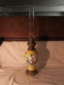 An oriental style ceramic oil lamp with chimney
