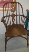 A wheel back Windsor chair with hoop stretcher