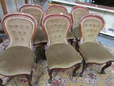 A set of 6 mahogany framed dining chairs