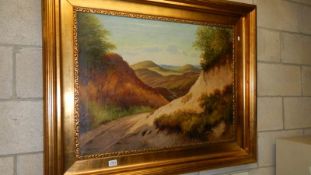 An oil on canvas 'European Mountain Range' signed V Leipzzer? 1919