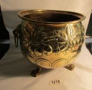 A Victorian brass jardiniere embossed with fruit