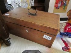 A Victorian partridge wood tea caddy.