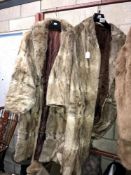 2 ladies long fur coats