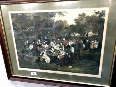 A framed and glazed picnic scene print and a framed and glazed horse scene