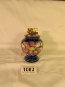 A Moorcroft baluster shape table lighter