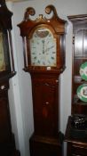 An oak 8 day painted dial Grandfather clock