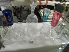A glass decanter and 9 glasses