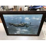 An oak framed aircraft print
