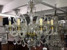 A pair of 8 arm glass chandeliers
