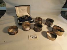 8 silver napkin rings including one cased,