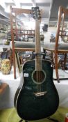 A Jay Turser 6 string guitar with inlay, neck straight, action good,