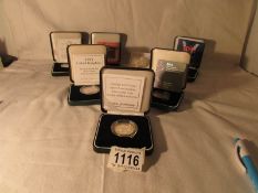 7 silver proof £2 coins,
