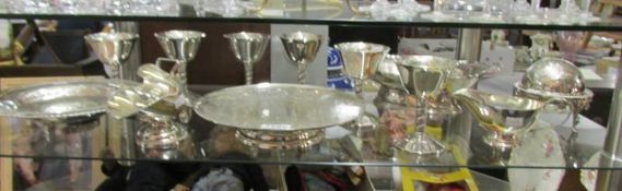 6 silver plated goblets, a silver plated basket, sugar bowl,