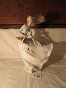 A Lladro figurine (repaired)