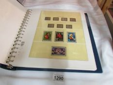 A Guernsey mint stamp collection in printed album (face value approximately £90)