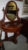 A mahogany Duchy dressing table with mirror